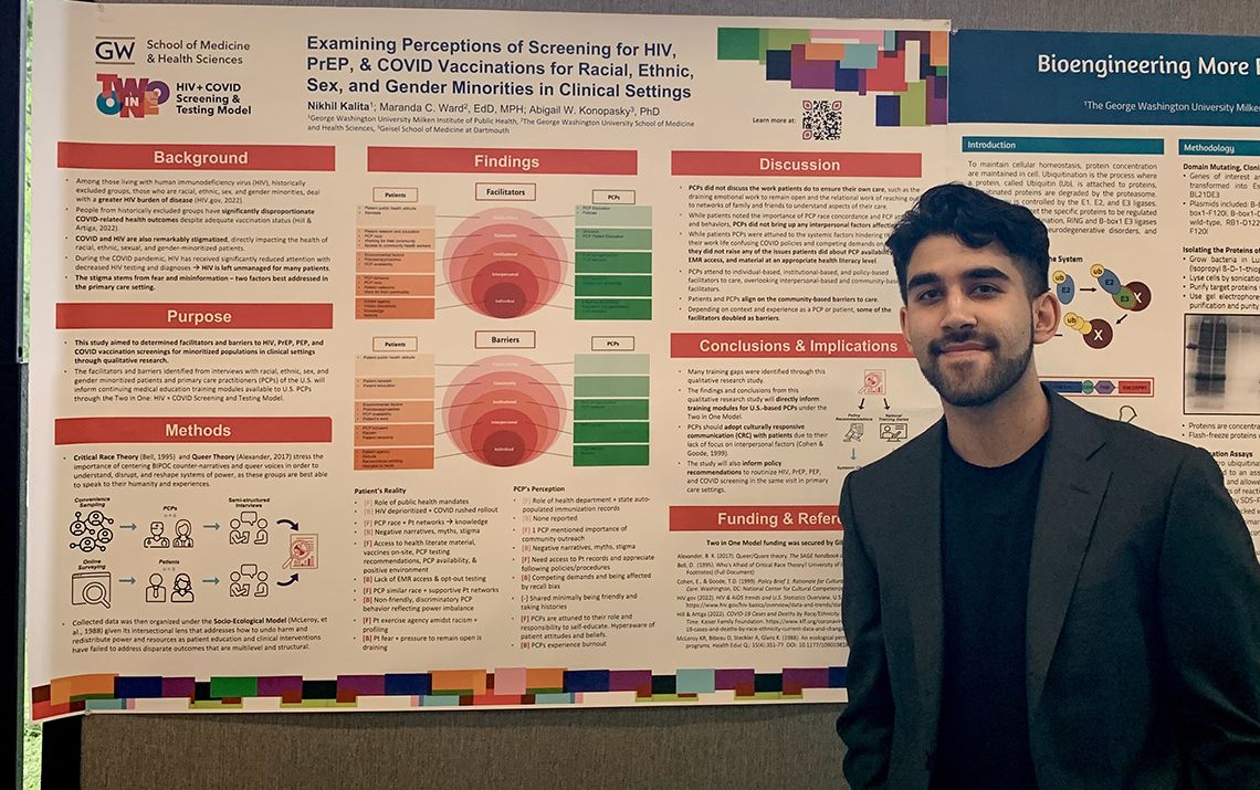 Researcher in front of their research poster