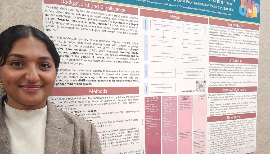 student with research poster